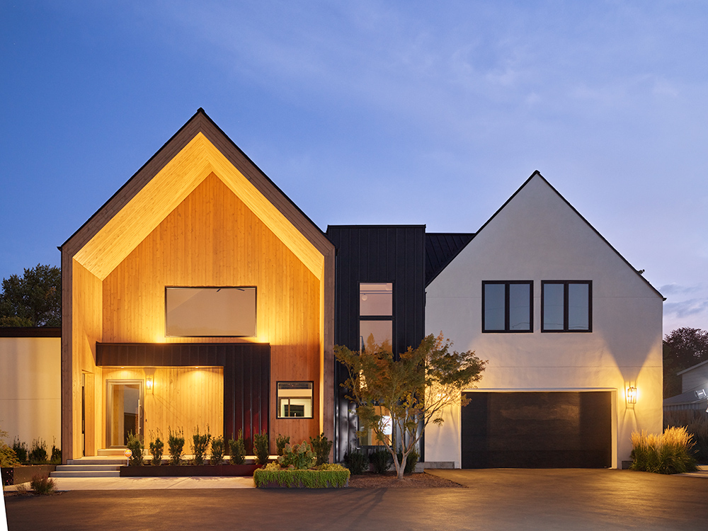 Contemporary two level home professionally photographed at dusk